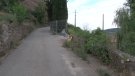Actuen sobre el mur d'accés al cementiri de Ripoll